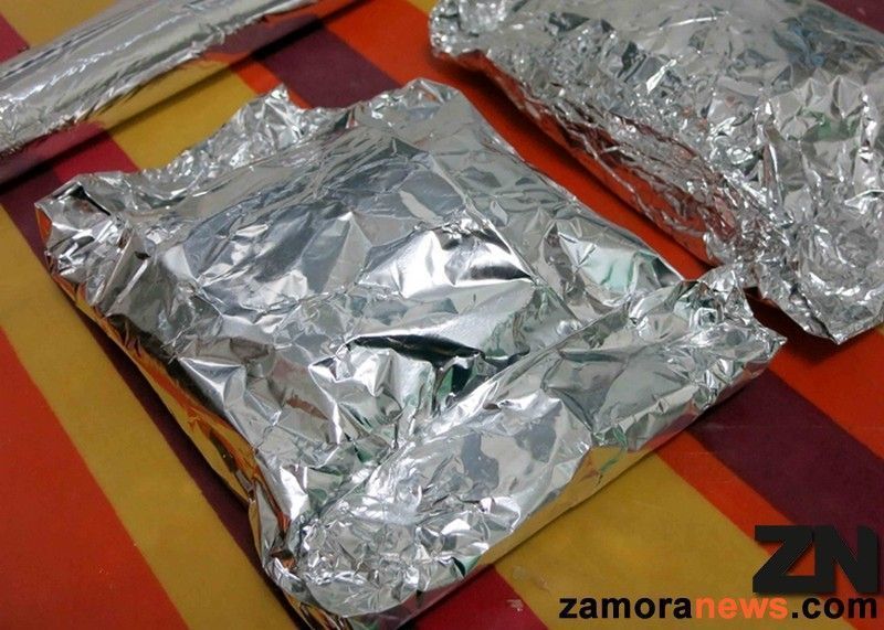 Merluza en papillote con juliana de verduras